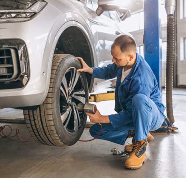 Mechanic changing a wheel